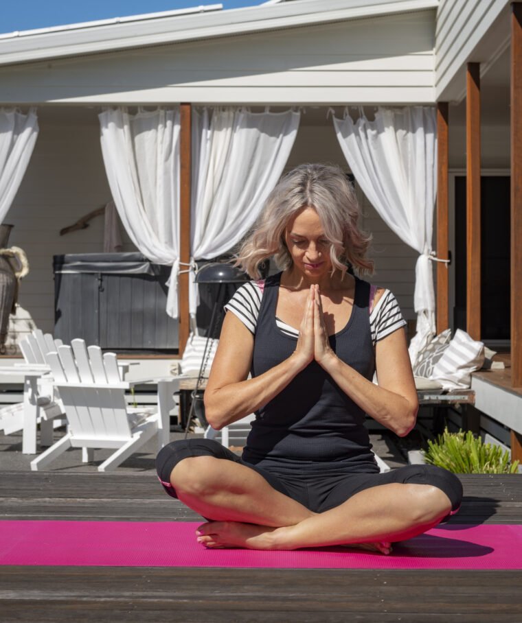 Cass in a yoga pose showing gratitude